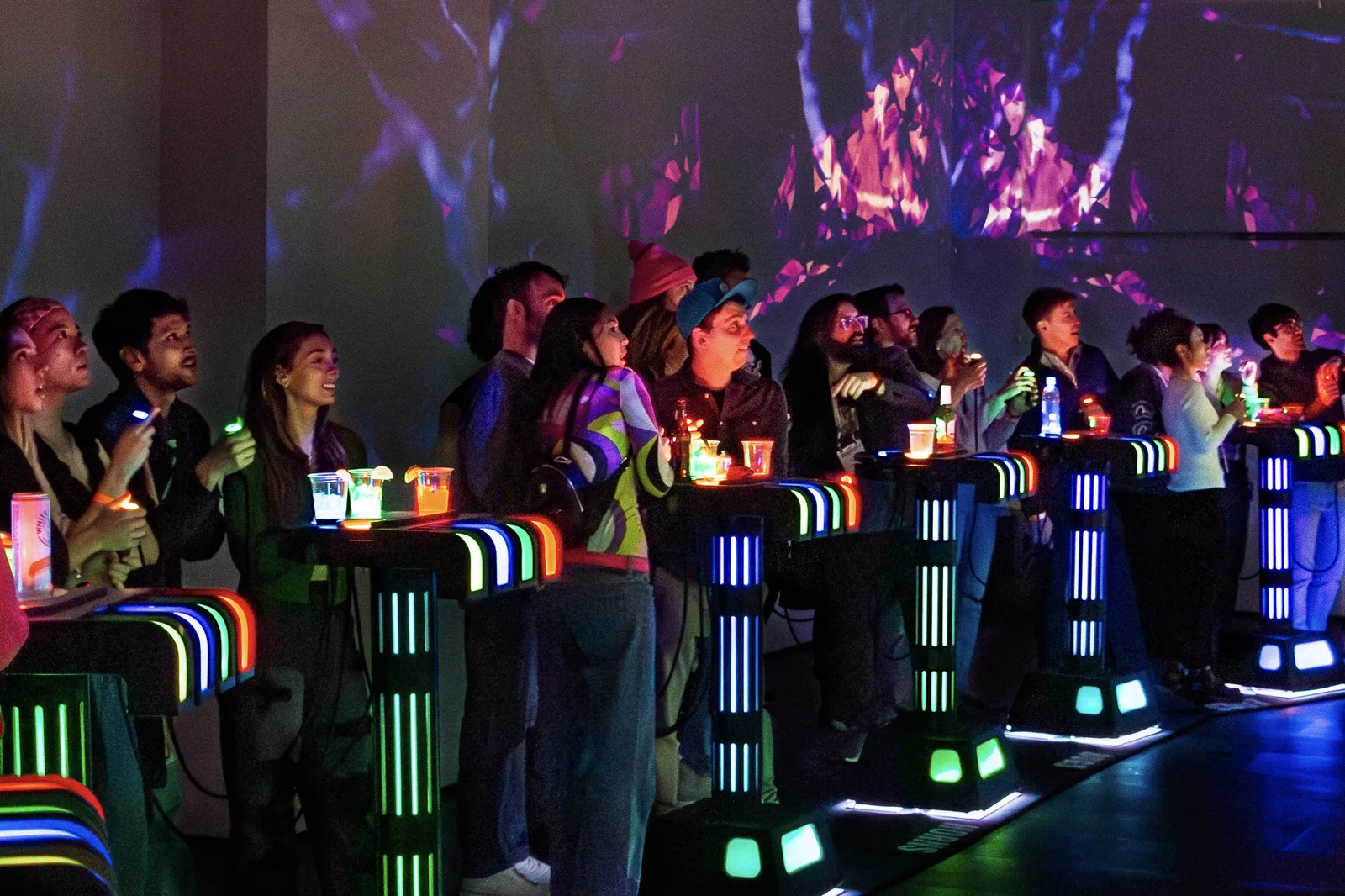 Players at Game of 1000 Boxes with LED wall