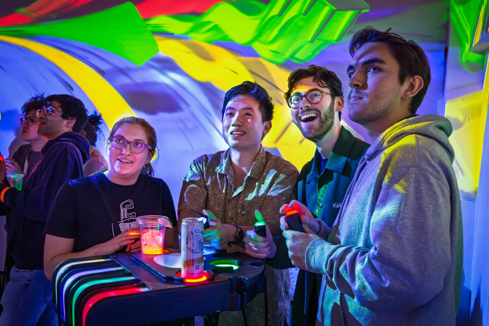 Friends celebrating at Game of 1000 Boxes